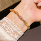 ✨Kaufe 2, erhalte 1 gratis💎 Retro Crossover Gedrehtes Mehrfarbiges Zirkon Verstellbares Armband für Damen